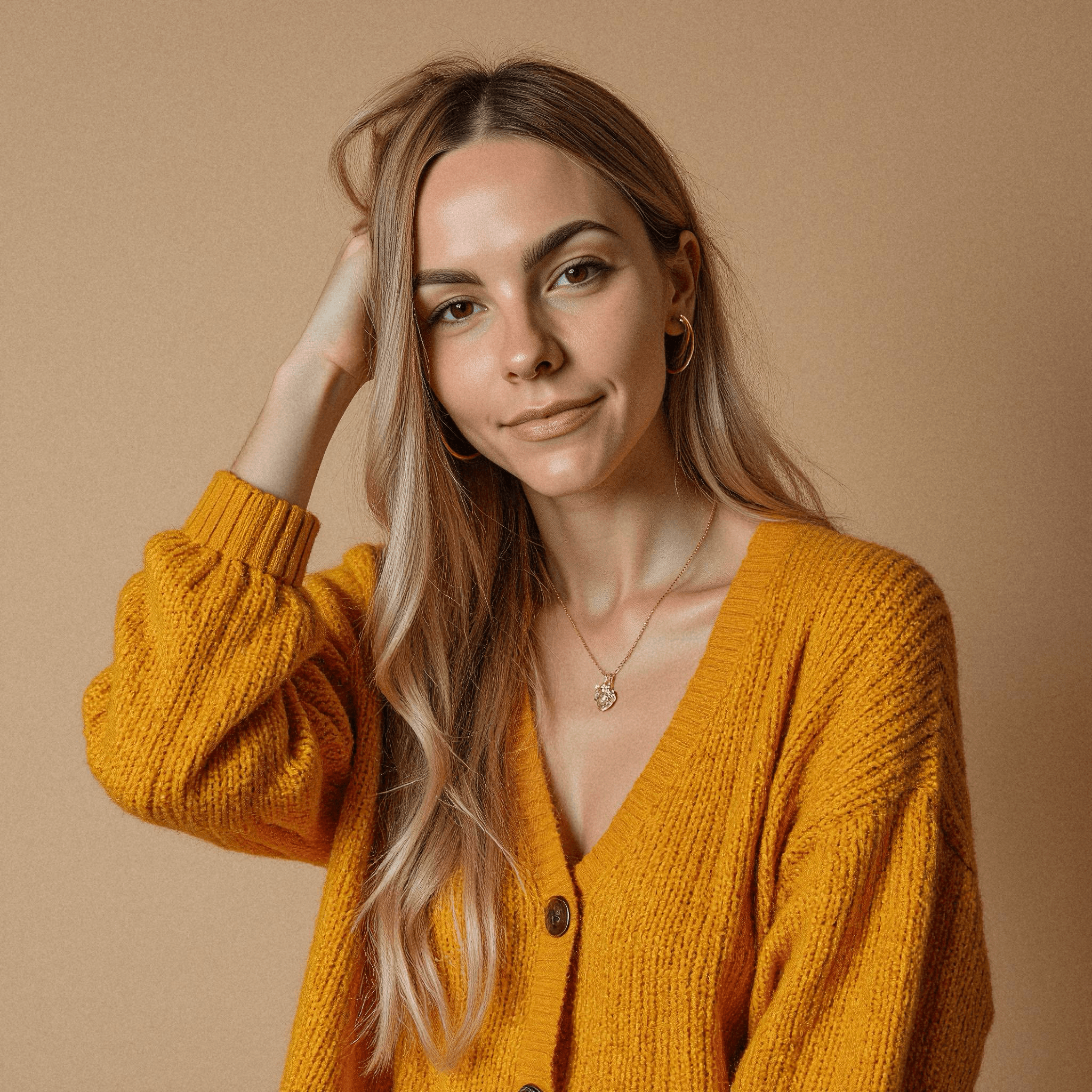 Woman in Golden Cardigan with Confident Pose
