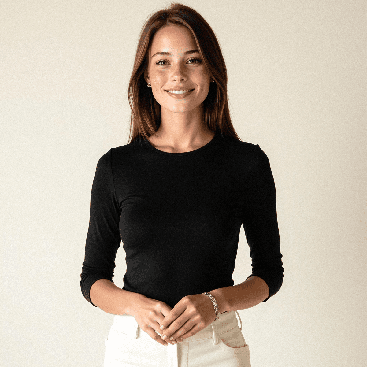 Confident woman in black top and trousers