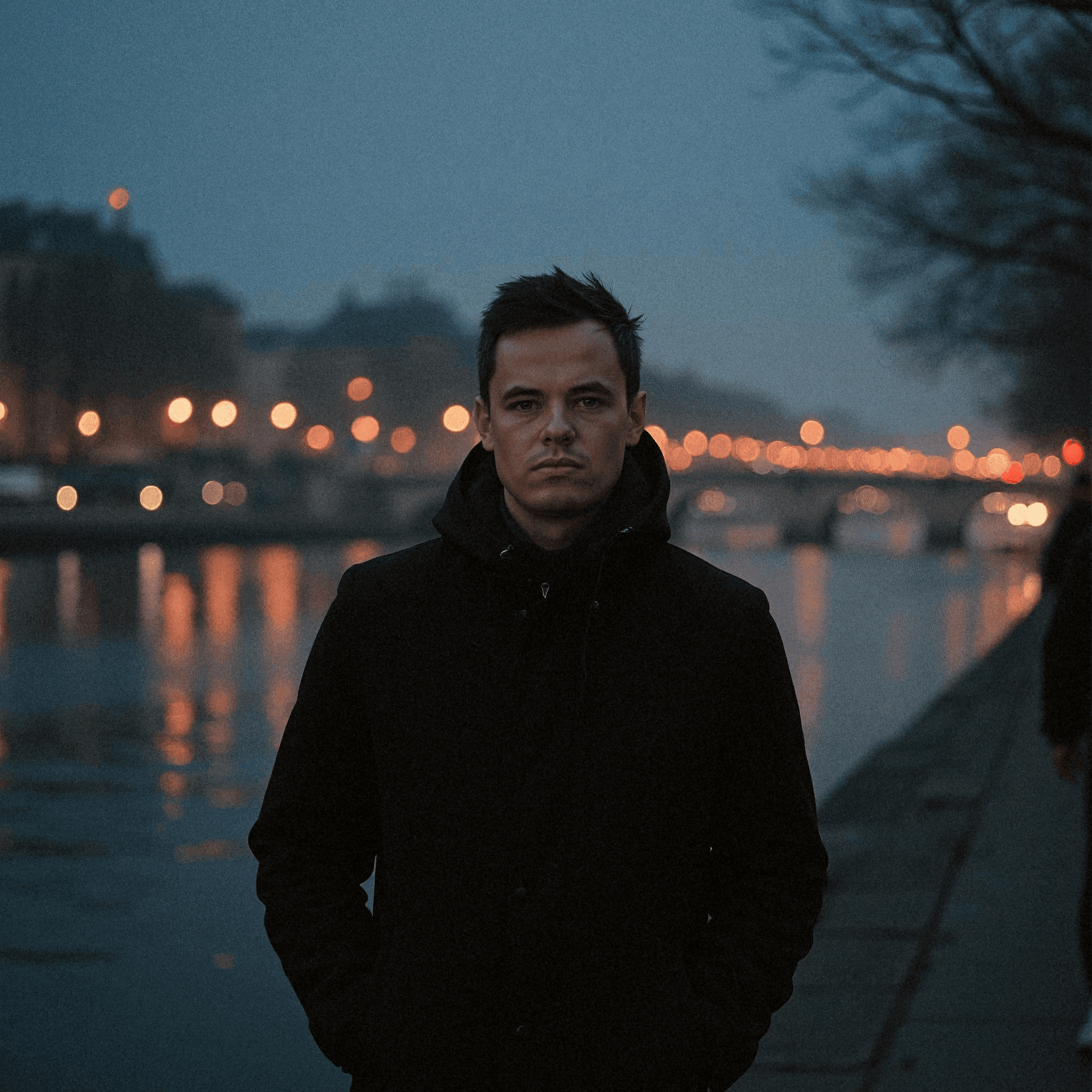 Man Walking Along Seine at Night