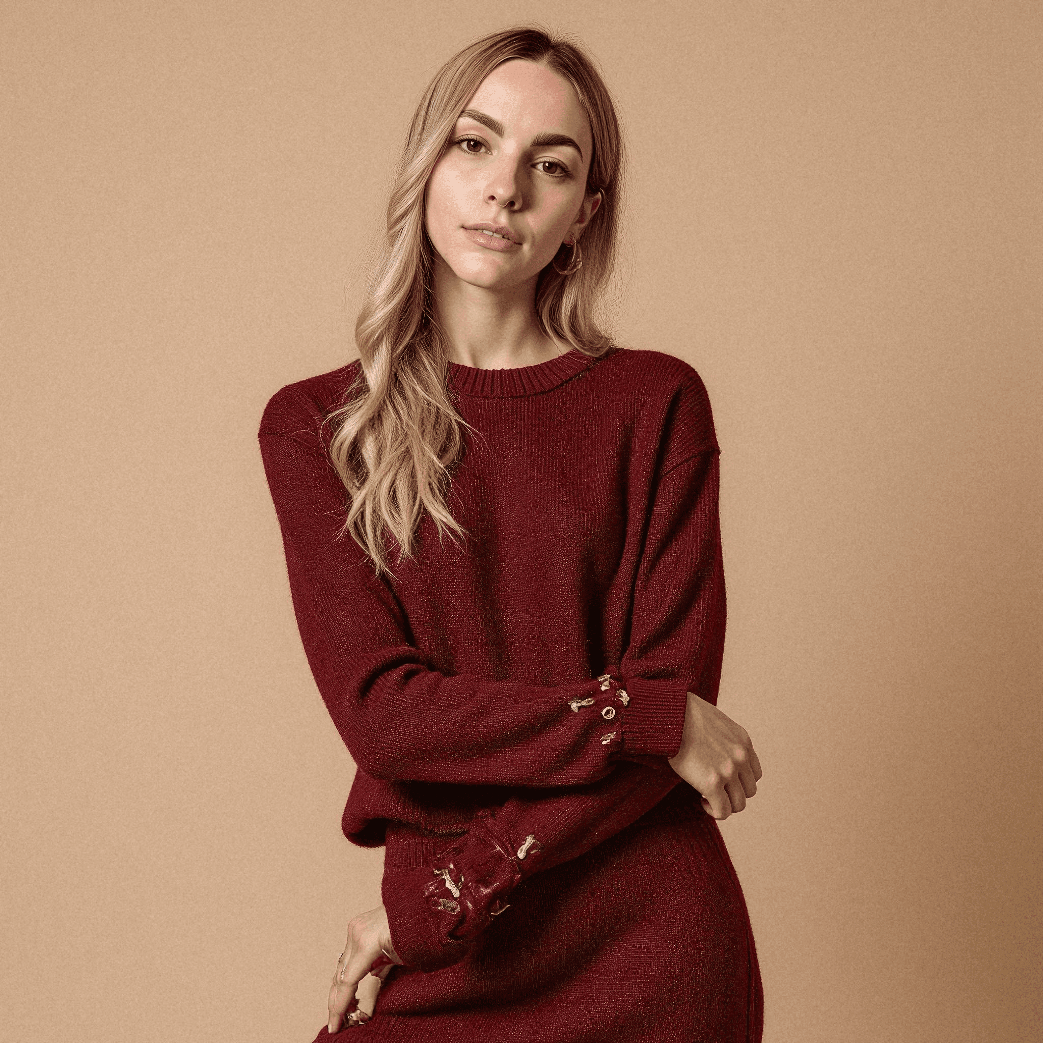 Woman in burgundy knit ensemble